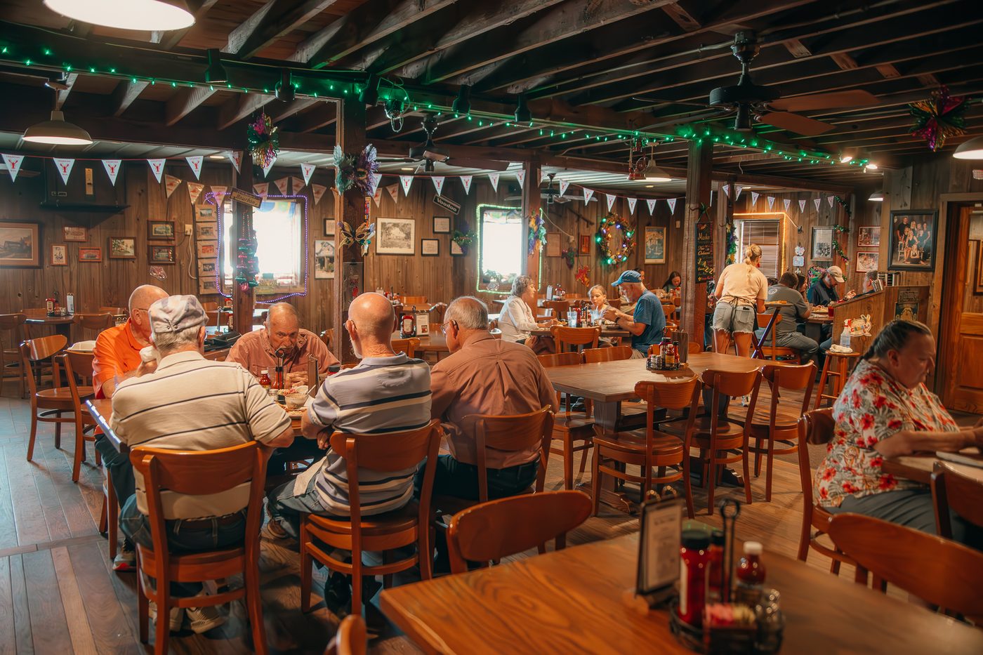 Guests dining in the rustic main room